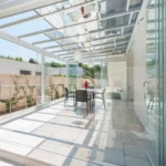 copertura mobile omnia_outdoor_protezioni_veranda_nubes_mob